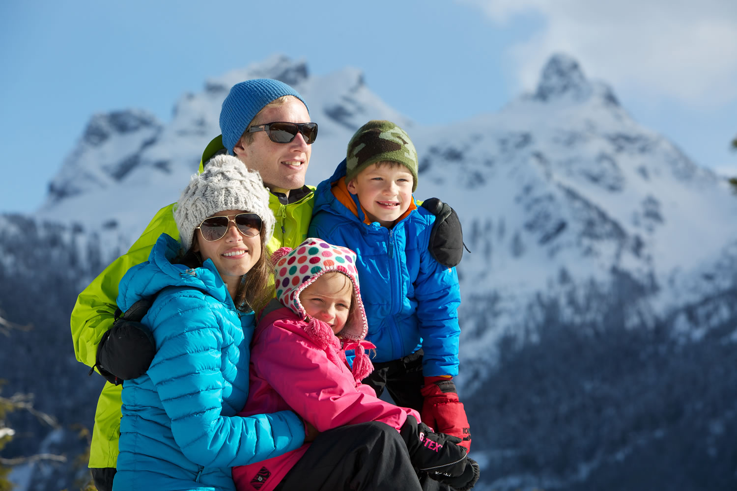 Family looking at view in Squamish Family looking at view in Squamish