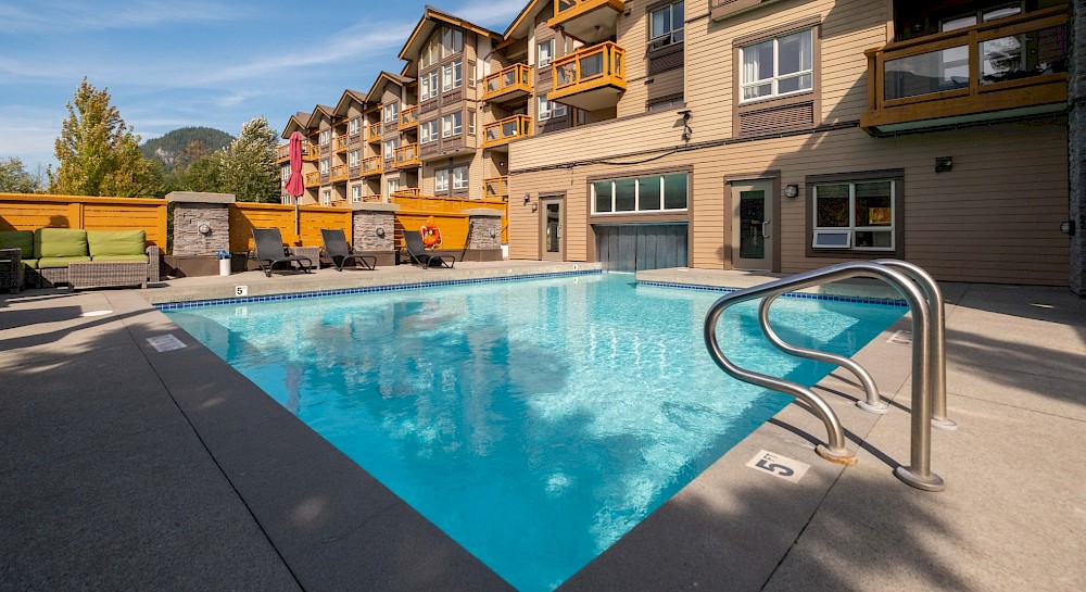 Squamish banners and hanging basket with Garibaldi in the background
