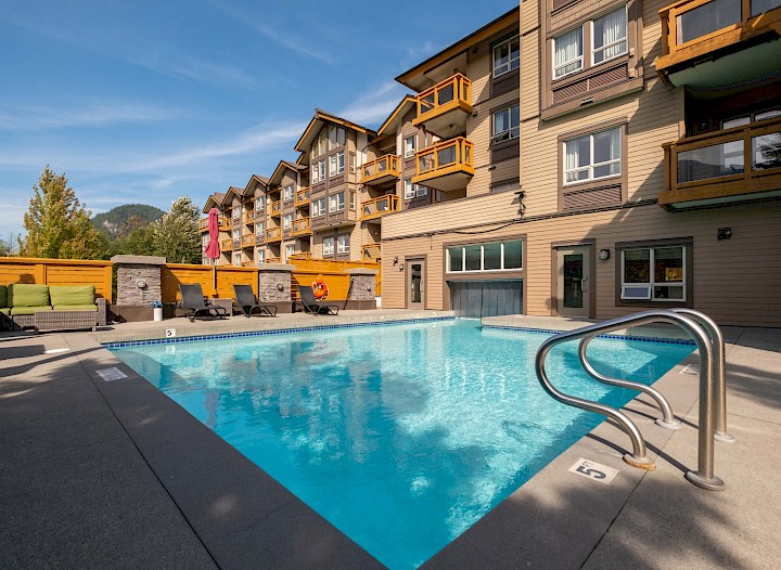 Squamish banners and hanging basket with Garibaldi in the background