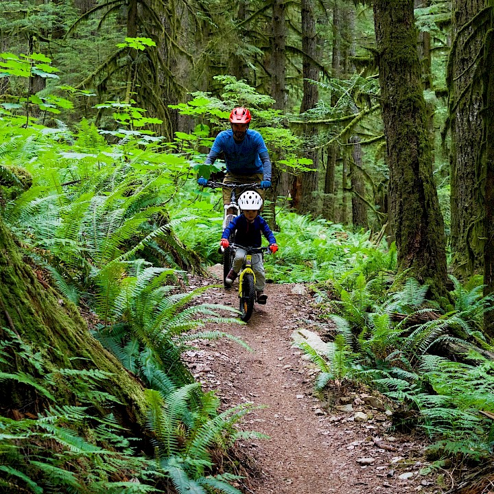 Father and son biking Squamish's trails