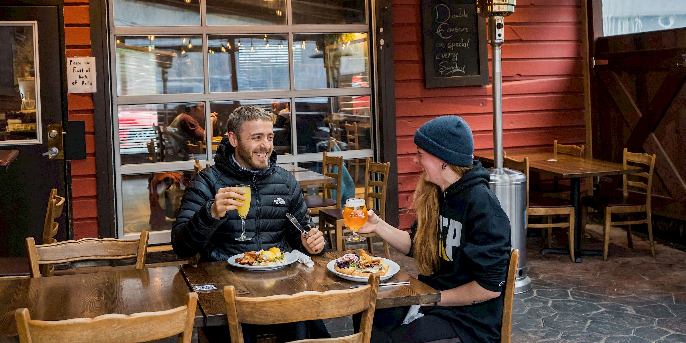 Couple eating outside at The Crabapple Cafe in Squamish