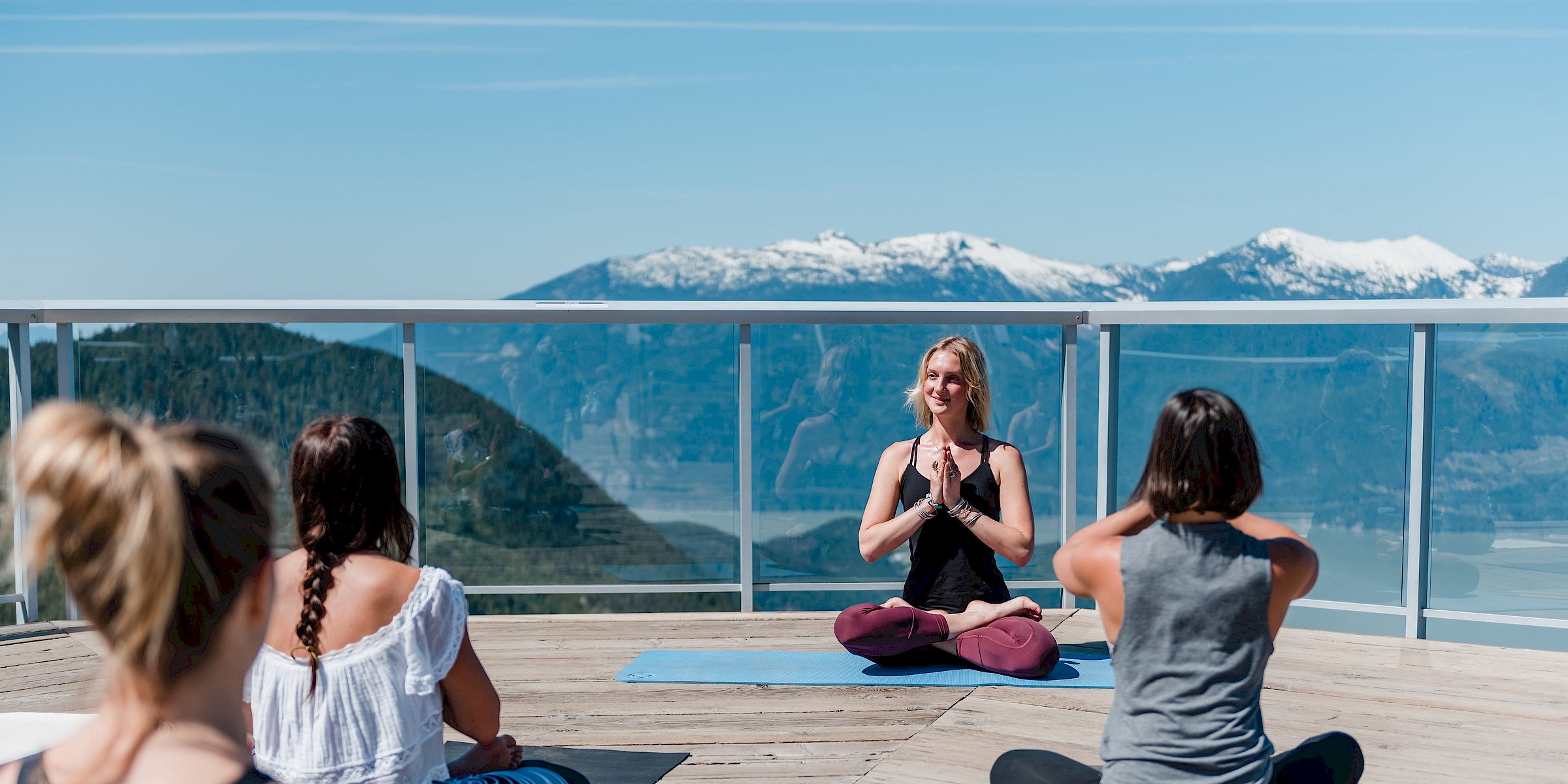 Yoga practice at the summit of the Sea to Sky gondola