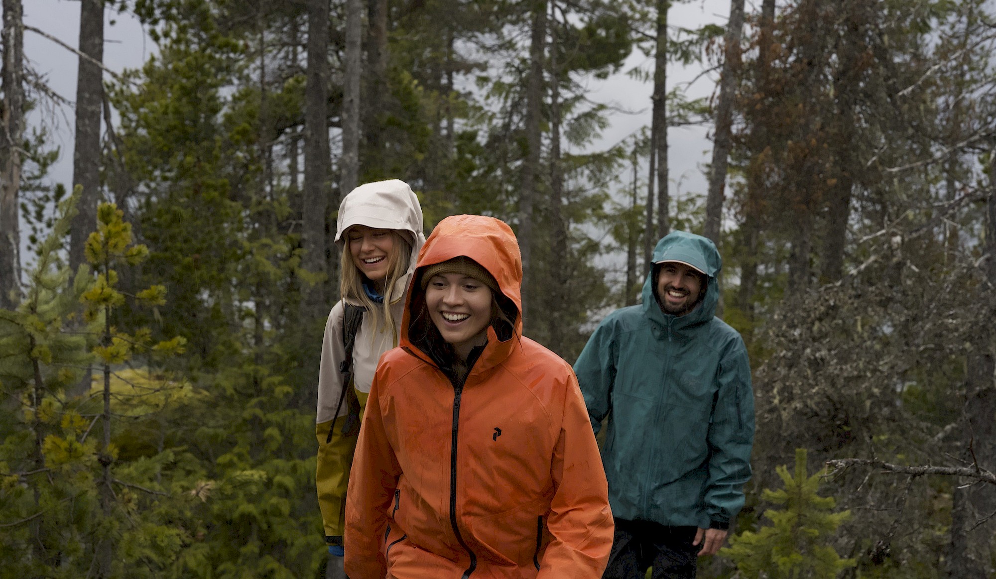 Group of friends hiking together in Squamish on a rainy day