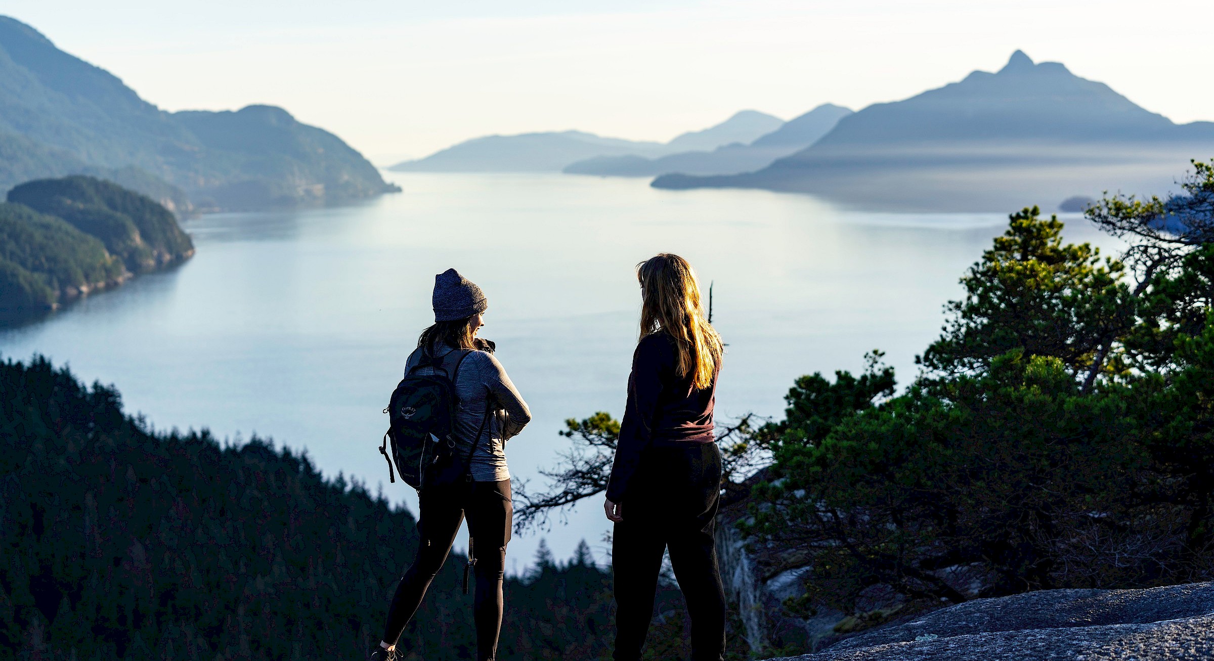 Female friends enjoying the view after hiking Murrin Loop Trail