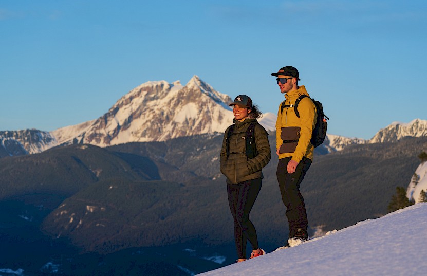 Hikers at the top of the Stawamus First Peak with snow