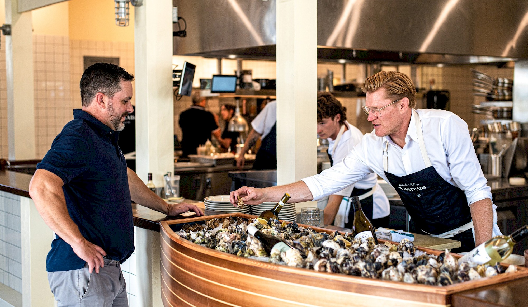 Chef showing guest oyster bar
