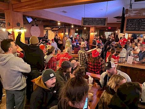 Fans watching the game at the Backyard