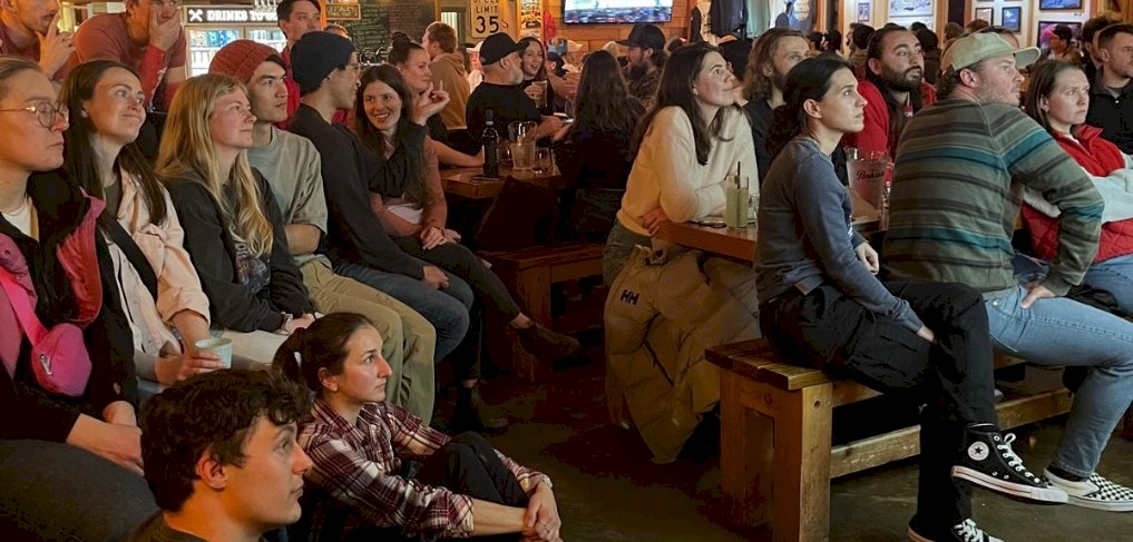 Fans watching a game at The Backyard