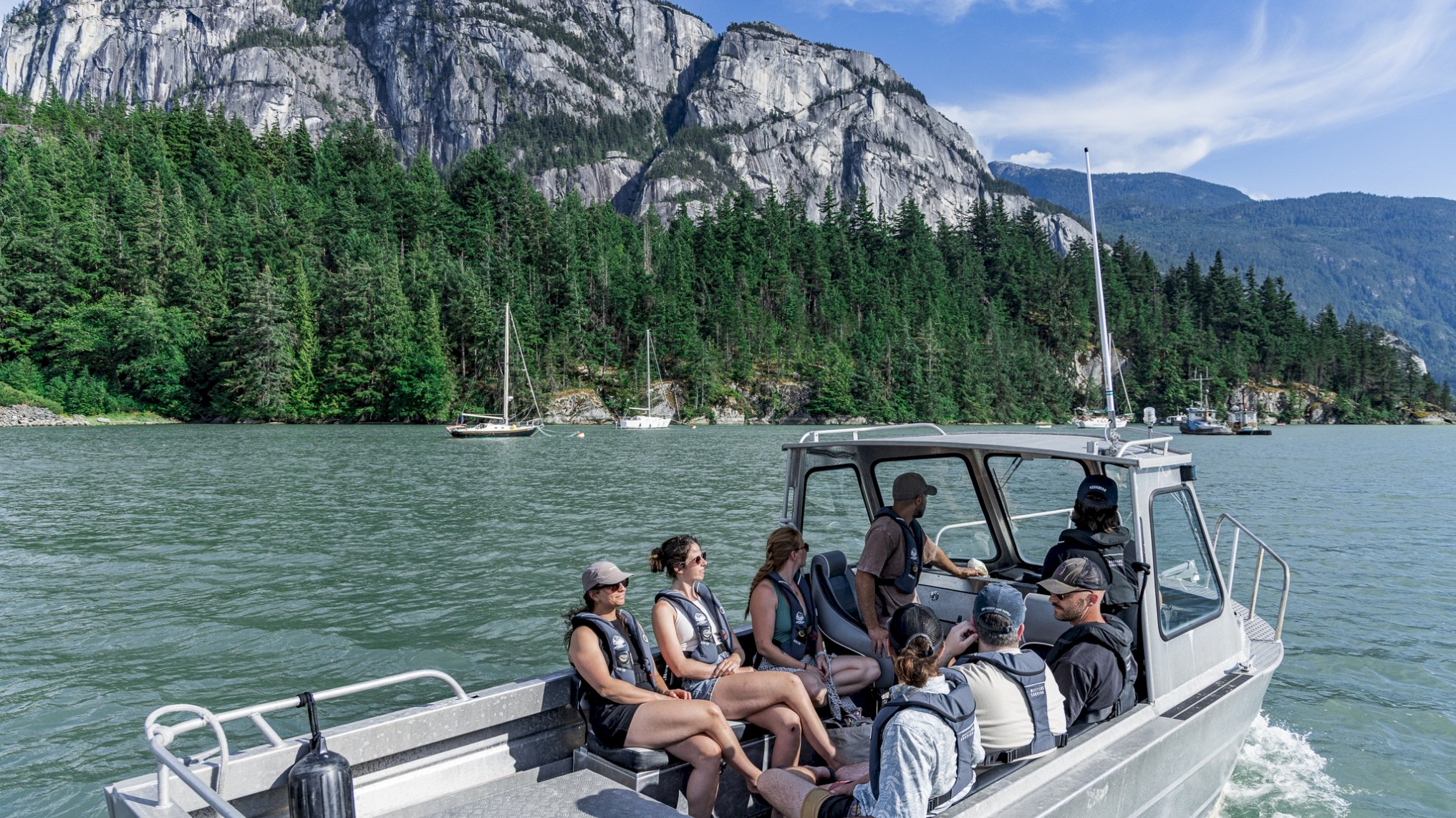Squamish Jetboat Journeys on the Howe sound in front of the Stawamus Chief